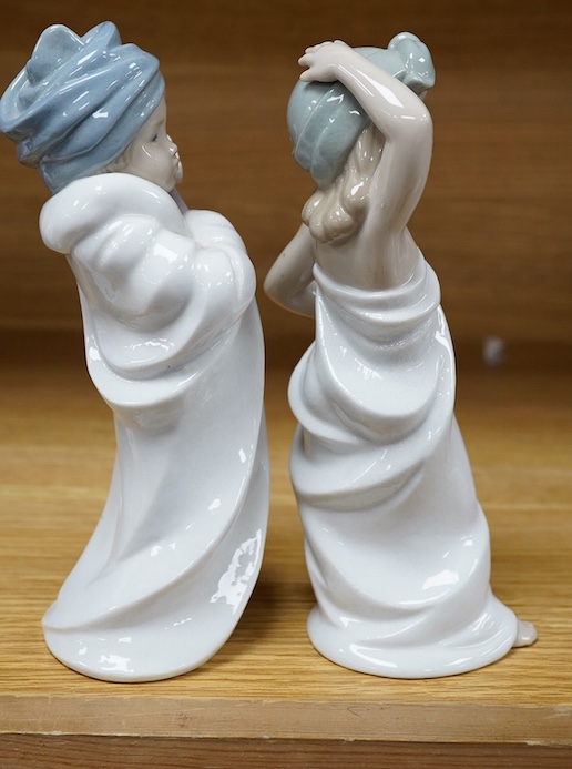 Two Lladro figures of children, 19cm high. Condition - good